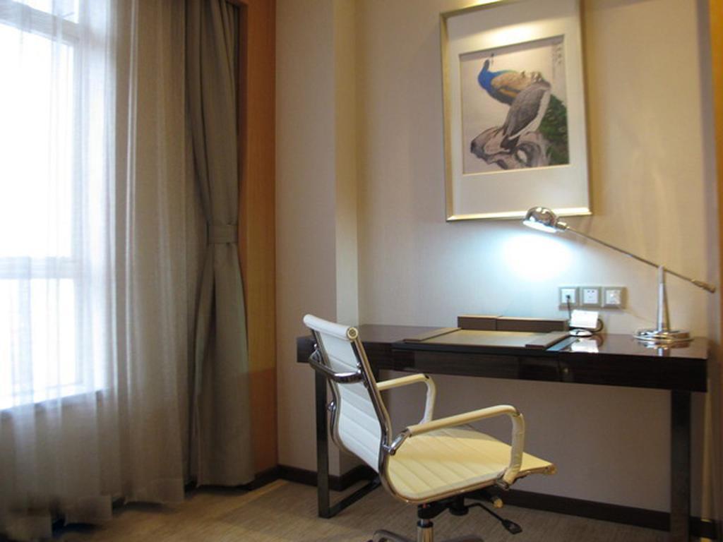 Guangzhou Manguo Internation Hotel Pokoj fotografie